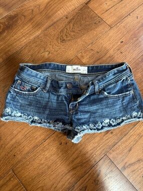 Hollister Women's Blue Denim Cutoff Shorts with Floral Hem